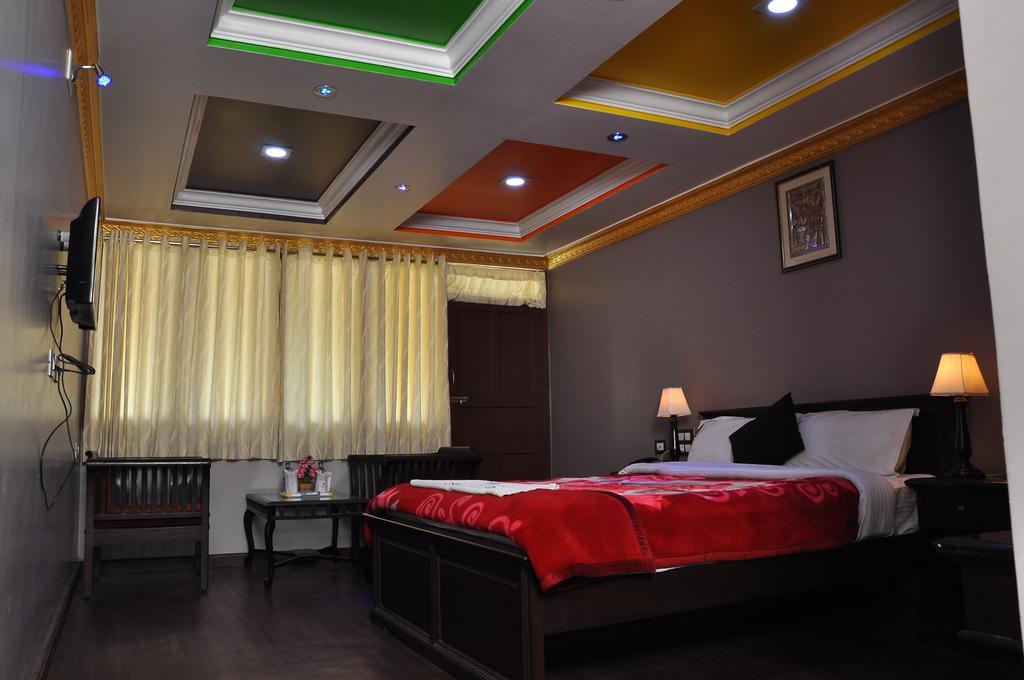 Grand Paradise Inn Kodaikanal Værelse billede