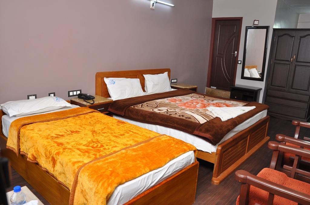 Grand Paradise Inn Kodaikanal Værelse billede