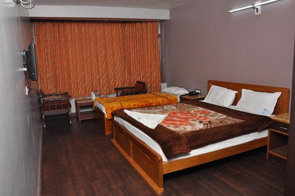 Grand Paradise Inn Kodaikanal Værelse billede