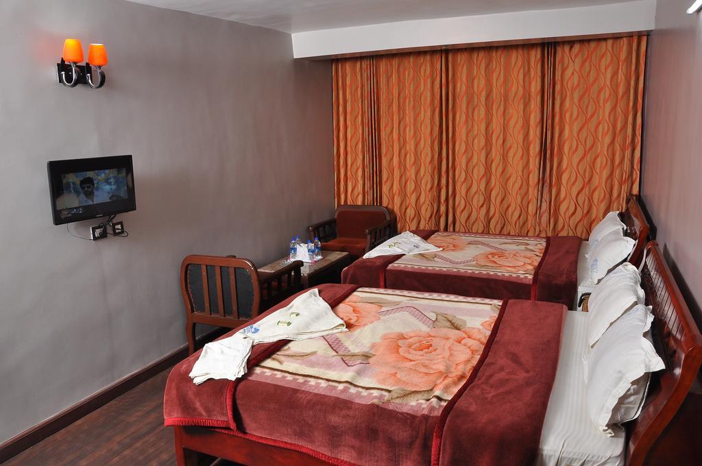 Grand Paradise Inn Kodaikanal Værelse billede